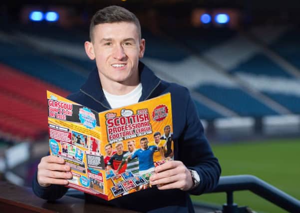 Rangers midfielder Fraser Aird launches Topps new 2015 SPFL Sticker Collection at Hampden Park. Picture: SNS