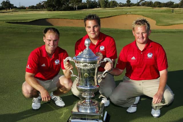 Gavin Dear, centre, with Wallace Booth and Callum Macaulay and the Eisenhower Trophy. Picture: Getty