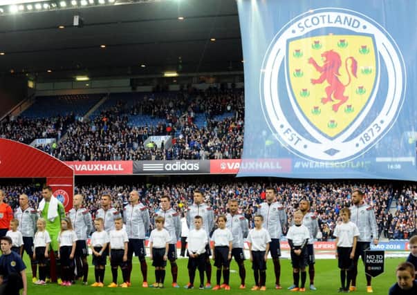 Scotland fans sing Flower of Scotland. Picture: TSPL