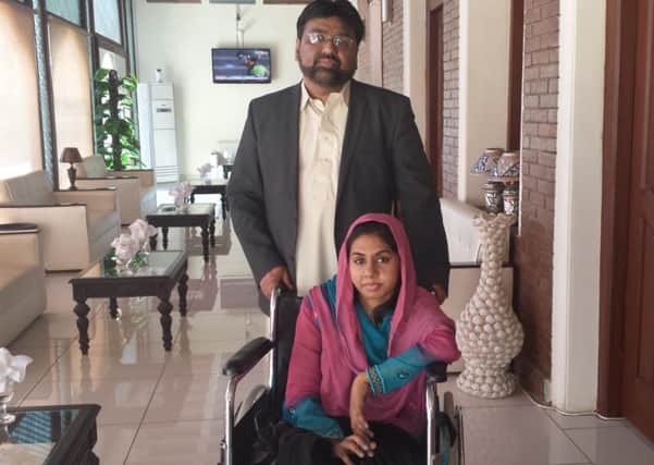 Farah Javed with her Uncle Rev Aftab Gohar in Pakistan in April 2014.  Picture: Hemedia