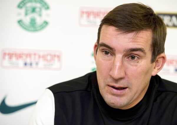 Hibernian Manager Alan Stubbs can only spectate on as fellow title contenders Hearts and Rangers clash at Ibrox. Picture: SNS