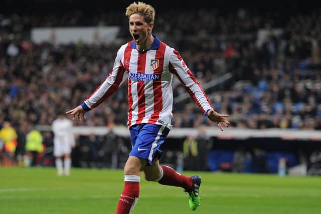 Atletico Madrids Fernando Torres celebrates the quickfire first of last nights double. Picture: Getty