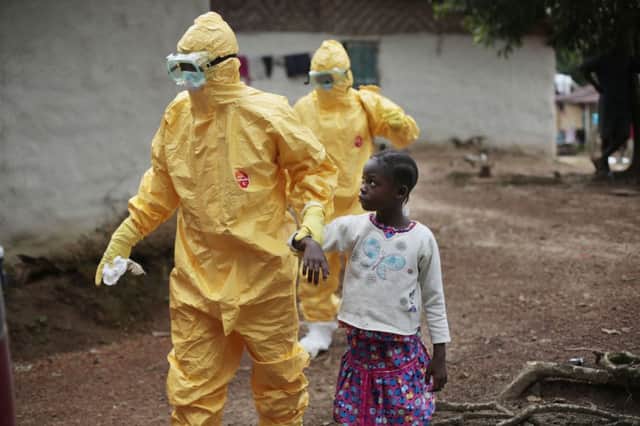 Health workers, like Pauline Cafferkey, the Scottish aid worker who contracted Ebola, are at risk, as are other overseas personnel. Picture: AP