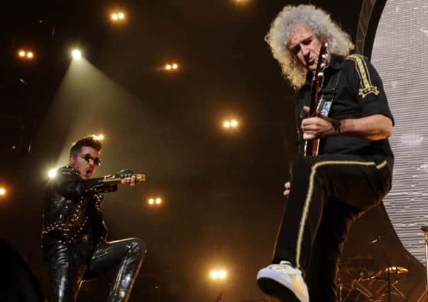 Adam Lambert was a worthy foil and an ideal fit for Brian May and Roger Taylor as Queen hit the high notes. Picture: Lisa Ferguson