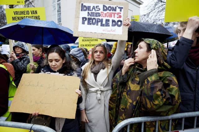 Protesters picket the Saudi Arabia embassy in The Hague over plight of Raif Badawi. Picture: Getty