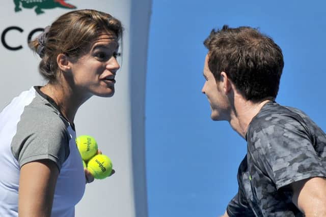 Andy Murray jokes with his coach Amelie Mauresmo as he fine-tunes his preparations for the Australian Open. Picture: AFP/Getty