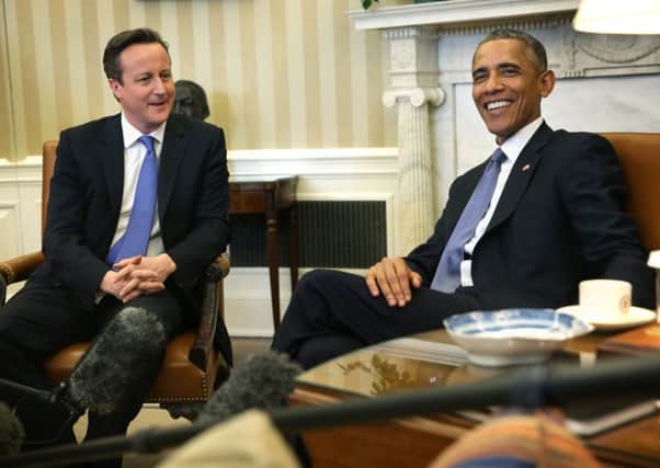 Mr Cameron and Barack Obama at the White House yesterday. PicturE: Getty