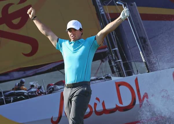 Rory McIlroy celebrates after his his holeinone. Picture: Andrew Redington/Getty