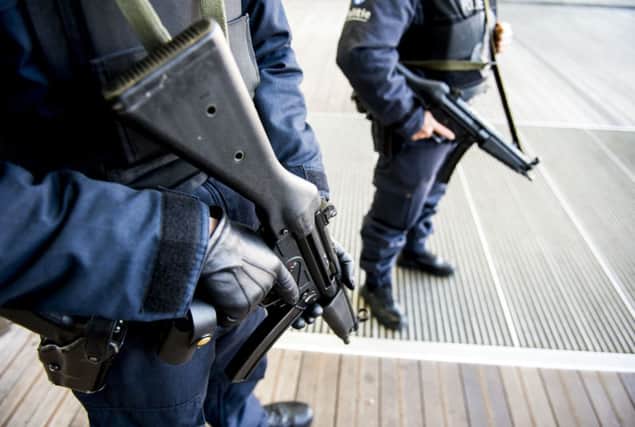 Armed police patrol in Belgium the day after an anti-terrorist operation. Picture: Getty