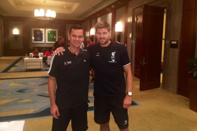Stephen Glass, left, with Steven Gerrard during the Englishmans visit to the US with Liverpool last year