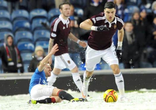 Steven Smith and Callum Paterson battle for the ball at Ibrox. Picture: Lisa Ferguson