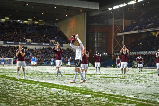 Neil Alexander applauds the Hearts support at Ibrox on Friday night. Picture: SNS