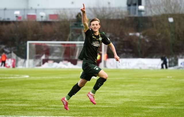 Liam Henderson wheels away after scoring Celtic's second. Picture: SNS