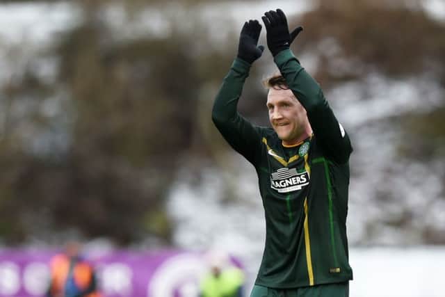 Kris Commons salutes the fans. Picture: SNS