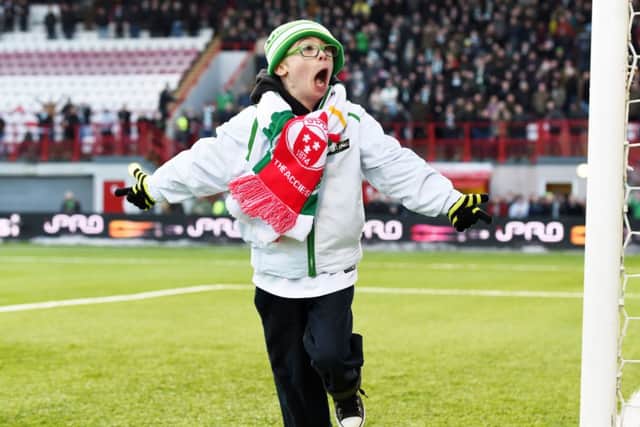 Jay Beatty celebrates after scoring in front of the Celtic fans at half time. Picture: SNS