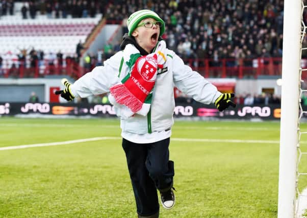 Jay Beatty celebrates after scoring in front of the Celtic fans at half time. Picture: SNS