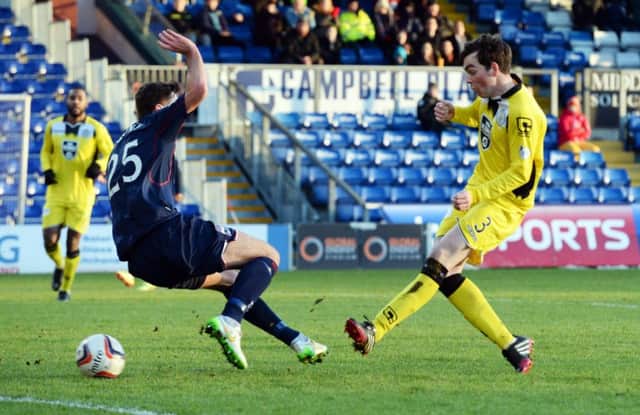 Sean Kelly slides the ball home to give St Mirren a 1-0 lead. Picture: SNS