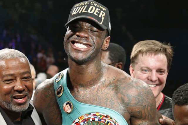 American Deontay Wilder is now unbeaten in 33 fights following Saturday nights points victory over Bermane Stiverne. Picture: AP