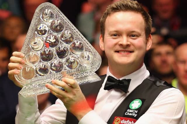 Shaun Murphy shows off his Masters trophy after beating world No 1 Neil Robertson 10-2 in the final. Picture: Getty