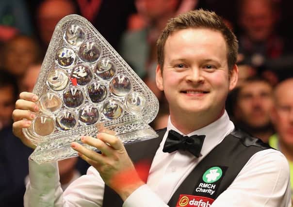 Shaun Murphy shows off his Masters trophy after beating world No 1 Neil Robertson 10-2 in the final. Picture: Getty