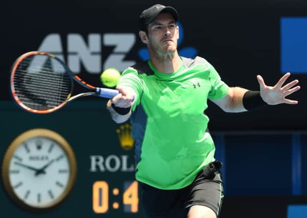 Andy Murray hits a return against India's Yuki Bhambri in their Australian Open first round tie. Picture: Getty