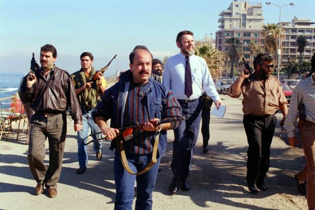 On this day in 1987 Terry Waite, second from right, was kidnapped while negotiating the release of hostages in Beirut. Picture: Getty