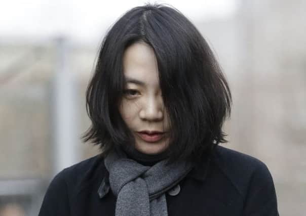 Ms Cho Hyun-ah arrives for questioning at the plane rage investigation in Seoul. Picture: AP