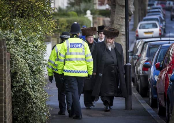 Orthodox Jews in Londons Stamford Hill  police patrols have been boosted. Picture: Getty