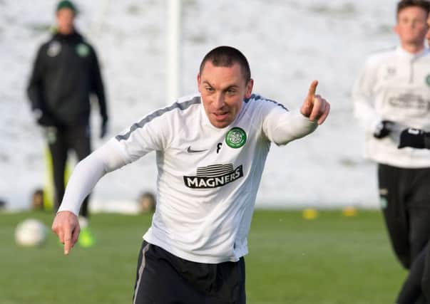 Scott Brown trains hard for Celtic's match against Motherwell. Picture: SNS