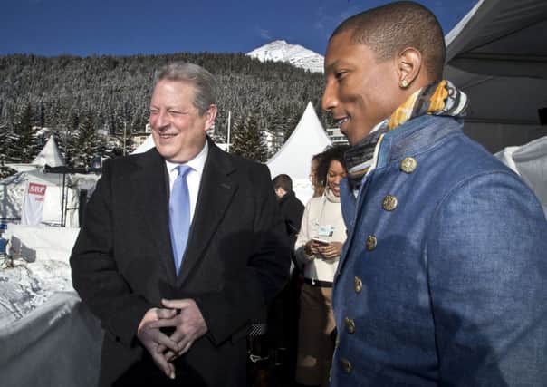 Al Gore and Pharrell Williams reveal their plans for a Live Earth Concert at Davos in the Swiss Alps yesterday. Picture: AP