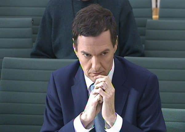 George Osborne wants to reduce powers for Scottish MPs and impose strict budget rules on Holyrood. Picture: PA