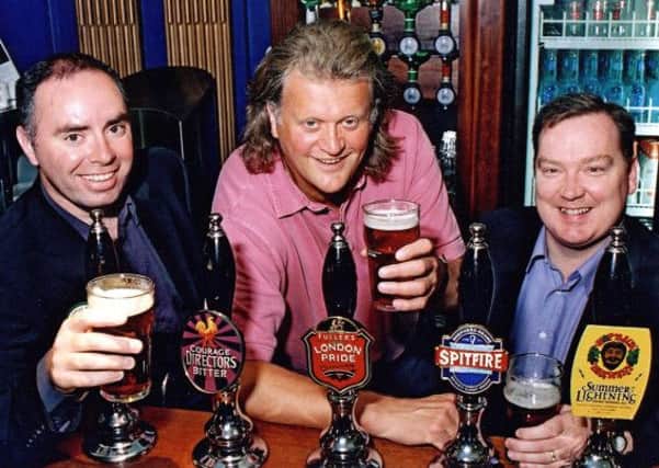 Wetherspoon's founder and chief, Tim Martin, centre. Picture: TSPL