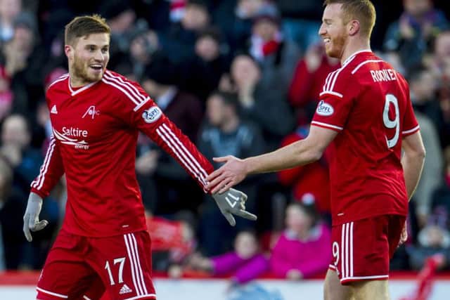 David Goodwillie, left, has extended his contract at Aberdeen. Picture: SNS