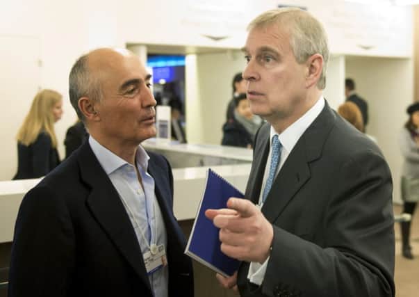 Prince Andrew talks with Spanish businessman Rafael del Pino CalvoSotelo at the World Economic Forum event. Picture: AP