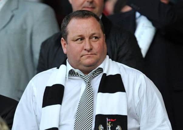 Mike Ashley has been criticised by Scots politicians. Picture: PA