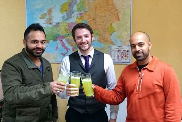From left, Yusuf Okhai, David Hastie and Sheryar Adam toast the deal for Nutrifiz to supply ­health food chain Holland & Barrett. Picture: Contributed