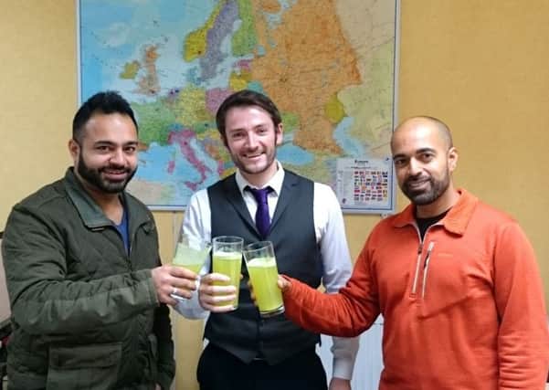 From left, Yusuf Okhai, David Hastie and Sheryar Adam toast the deal for Nutrifiz to supply health food chain Holland & Barrett. Picture: Contributed
