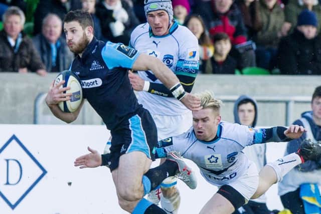 Glasgows Tommy Seymour evades Montpelliers Ben Lucas in last years Champions Cup.   Picture: SNS/SRU
