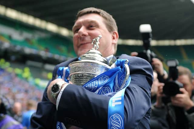St Johnstone manger Tommy Wright celebrates winnin the cup. Picture: TSPL