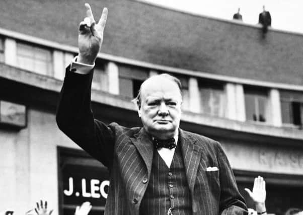 The classic image of Sir Winston Churchill, producing his signature V for Victory sign.   Pictures:PA and Getty