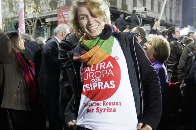 Supporters of radical left Syriza party wear a t-shirt saying "Another Europe with Tsipars". Picture: Getty