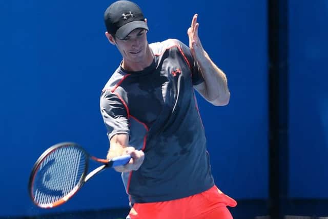 Andy Murray got in some practice hitting in Melbourne yesterday. Photograph: Clive Brunskill/Getty
