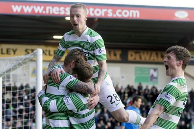 Celtic's Kris Commons celebrates his goal with teammates. Picture: PA