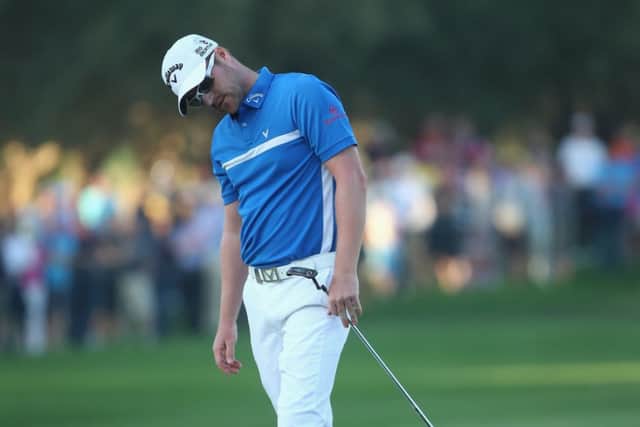 Scotlands Marc Warren watches his putt fail and with it his chance of winning. Photograph: Getty