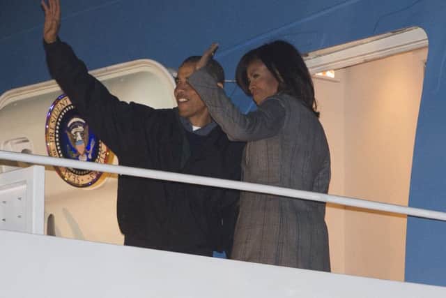 US President Barack Obama and First Lady Michelle Obama board Air Force One. Picture: Getty