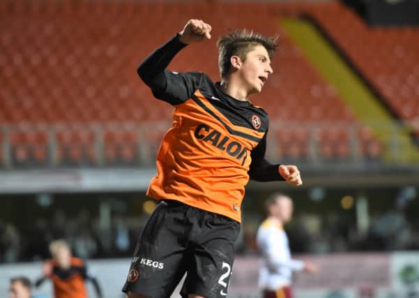 Dundee United's Charlie Telfer celebrates having scored a second for his side 3-1. Picture: SNS