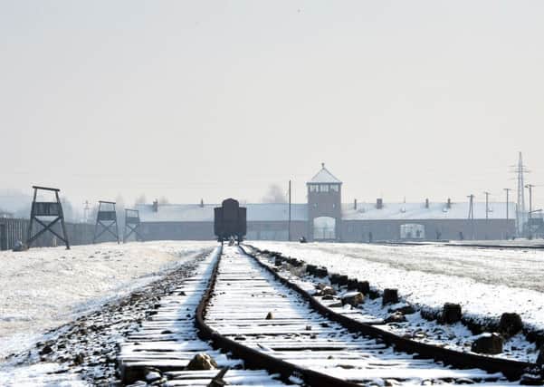 Symbol of hate: Auschwitz, whose liberation 70 years ago tomorrow is marked by Holocaust Memorial Day.  Picture: Getty