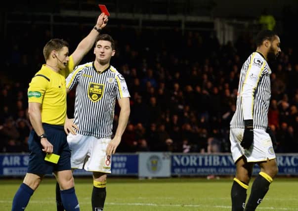 Steven McLean gives Yoann Arquin a second booking and a red card for simulation. Picture: SNS
