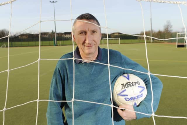 Hibernian legend Ally Brazil with the match ball from the game against Celtic where he scored a hat-trick. Picture: Greg Macvean