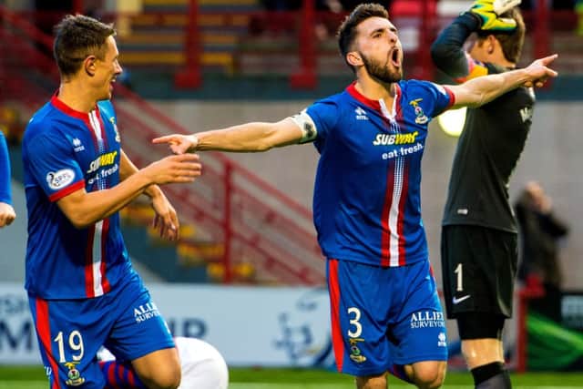 Inverness captain Graeme Shinnie (right) and Danny Williams celebrate after Hamilton's Grant Gillespie scores a own goal to put the visitors ahead. Picture: SNS